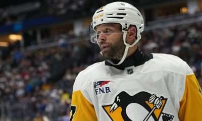Pittsburgh Penguins right winger Bryan Rust in an NHL game photo used with the injury update.