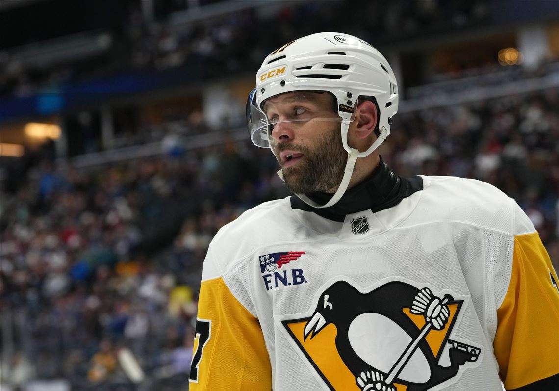 Pittsburgh Penguins right winger Bryan Rust in an NHL game photo used with the injury update.